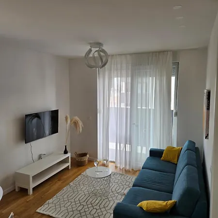 Apartment With Garage Parking Space
